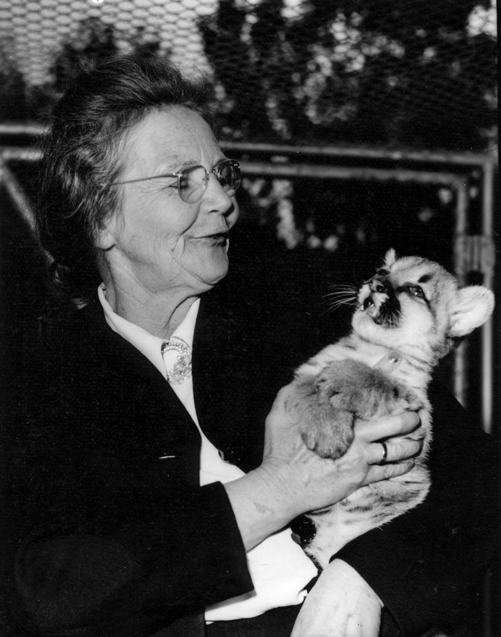 Belle Benchley with a mountain lion cub