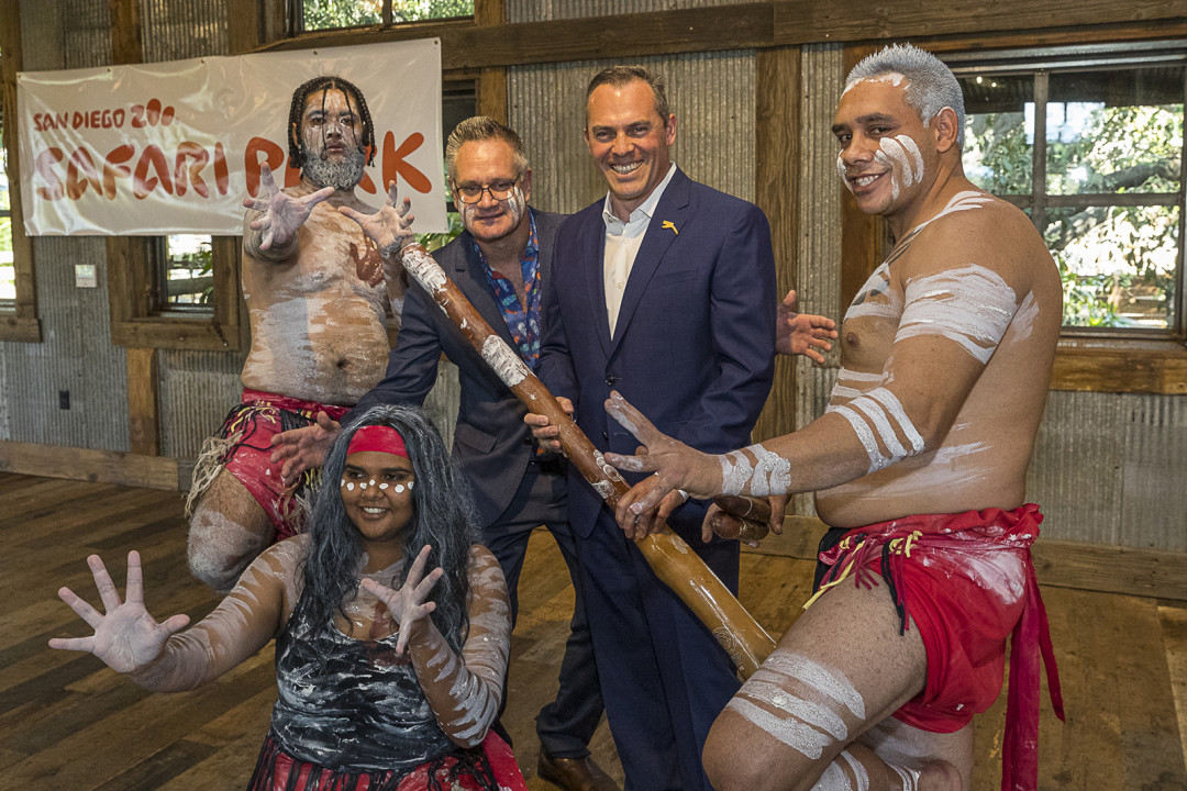 Paul posed with the Australian first people's group who helped open the platypus habitat at the Safari Park.